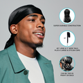Smiling man wearing a black silky satin durag, with text highlighting super durable construction, 40" long &amp; 3" wide tails, and front or back tie options.
