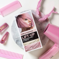 KISS Colors &amp; Care Lift Up Complete Bleach &amp; Tone Kit in Rose with before and after hair color swatches, placed on a marble plate surrounded by pink hair tools.