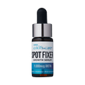 Small amber glass dropper bottle with a white and blue label reading "Kiss Colors &amp; Care Spot Fixer Growth Serum," highlighting "11,000 mcg Biotin" and ingredients caffeine, rosemary, and niacinamide.