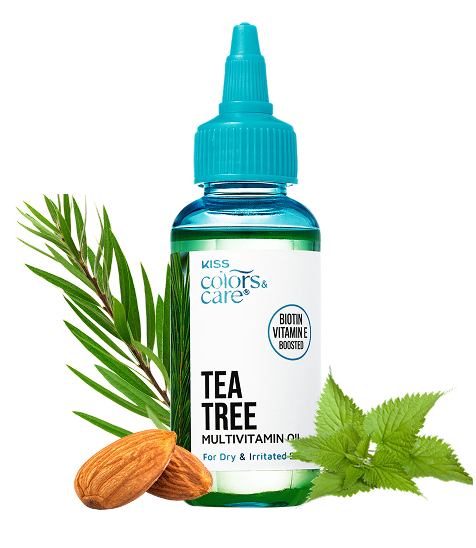 Clear plastic bottle with a turquoise cap labeled "Kiss Colors & Care Tea Tree Multivitamin Oil" with biotin vitamin E boost, surrounded by green leaves and almonds.