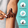 Hand holding dark wooden KISS Colors &amp; Care gua sha tool on forearm, highlighting benefits: boosts circulation, promotes healthier oil absorption, relieves muscle tension.